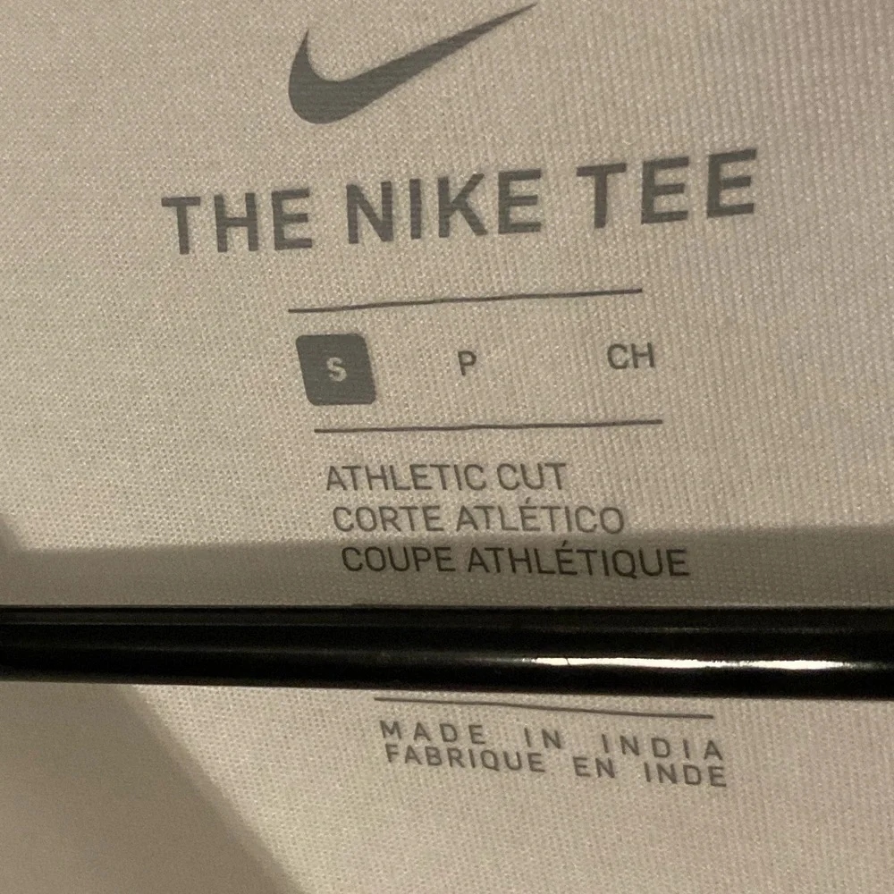 4/$25 Nike tee athletic cut shirt white with pink Nike logo in size small